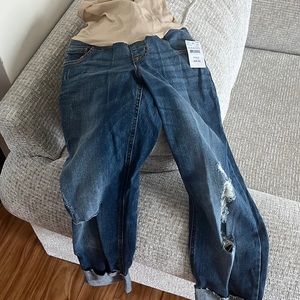 Maternity cropped pants with rips in knee.